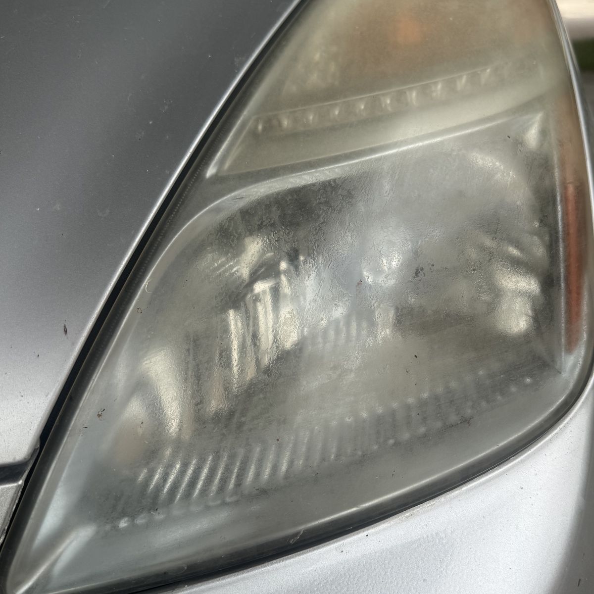 Toyota Prius, cloudy passenger lens before headlight restoration, Utah Valley